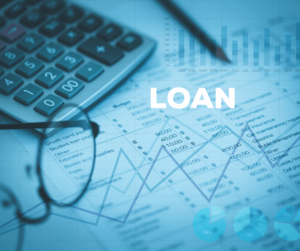 Loan application with glasses and calculator