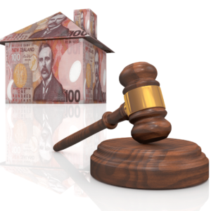 Auction hammer and house of $100 bills